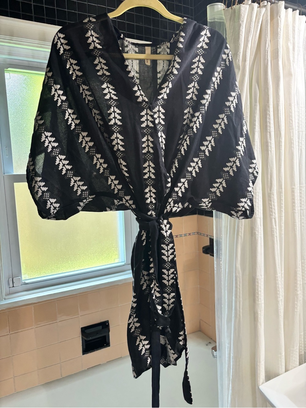 Black Sheer Tie-Front romper with White Embroidered Pattern